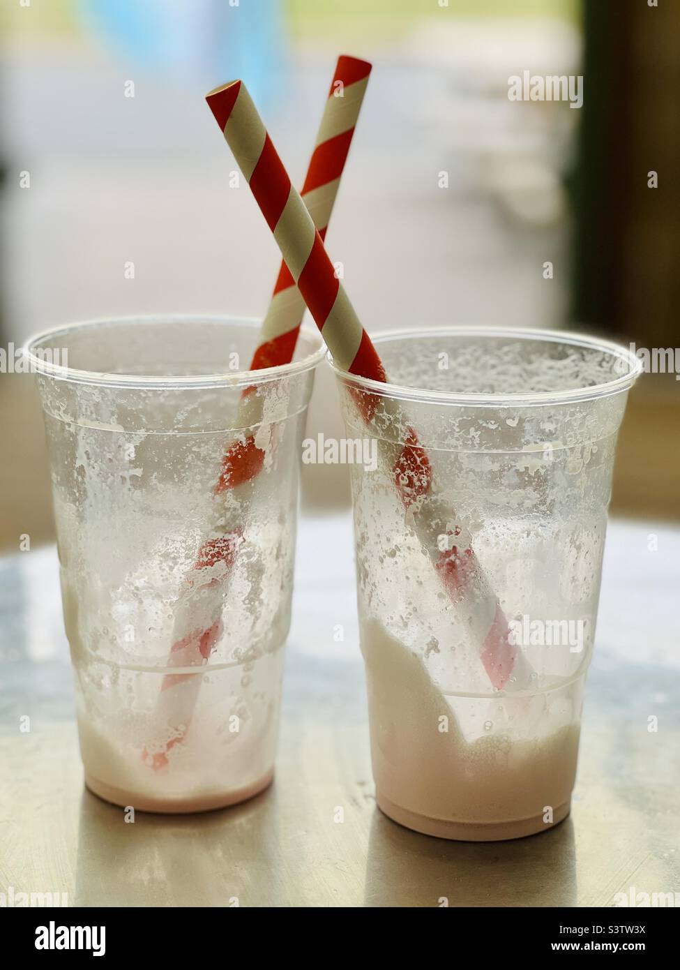 https://c8.alamy.com/comp/S3TW3X/two-empty-milkshake-cups-S3TW3X.jpg