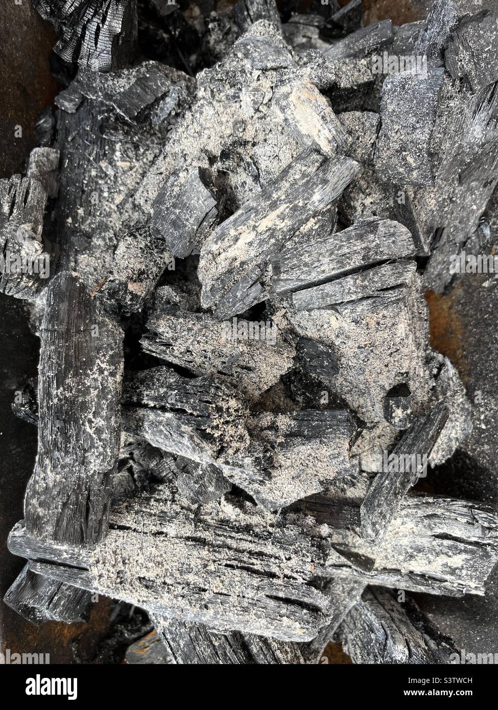 Full frame grey burnt charcoal background - Smartphone Captured Stock Image