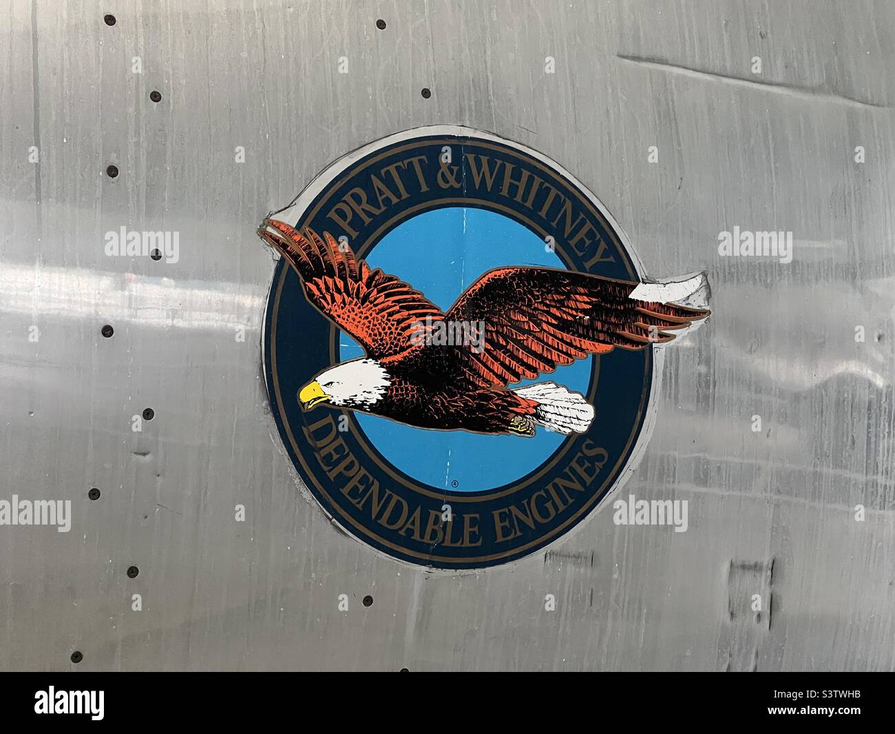 WASHINGTON, USA, DEC 2021: Close-up, Pratt and Whitney logo with flying eagle, on the side of a jet aircraft engine Stock Photo