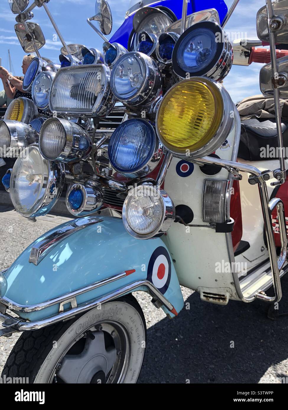 Classic scooter with a circular Union Jack sticker and many mirrors