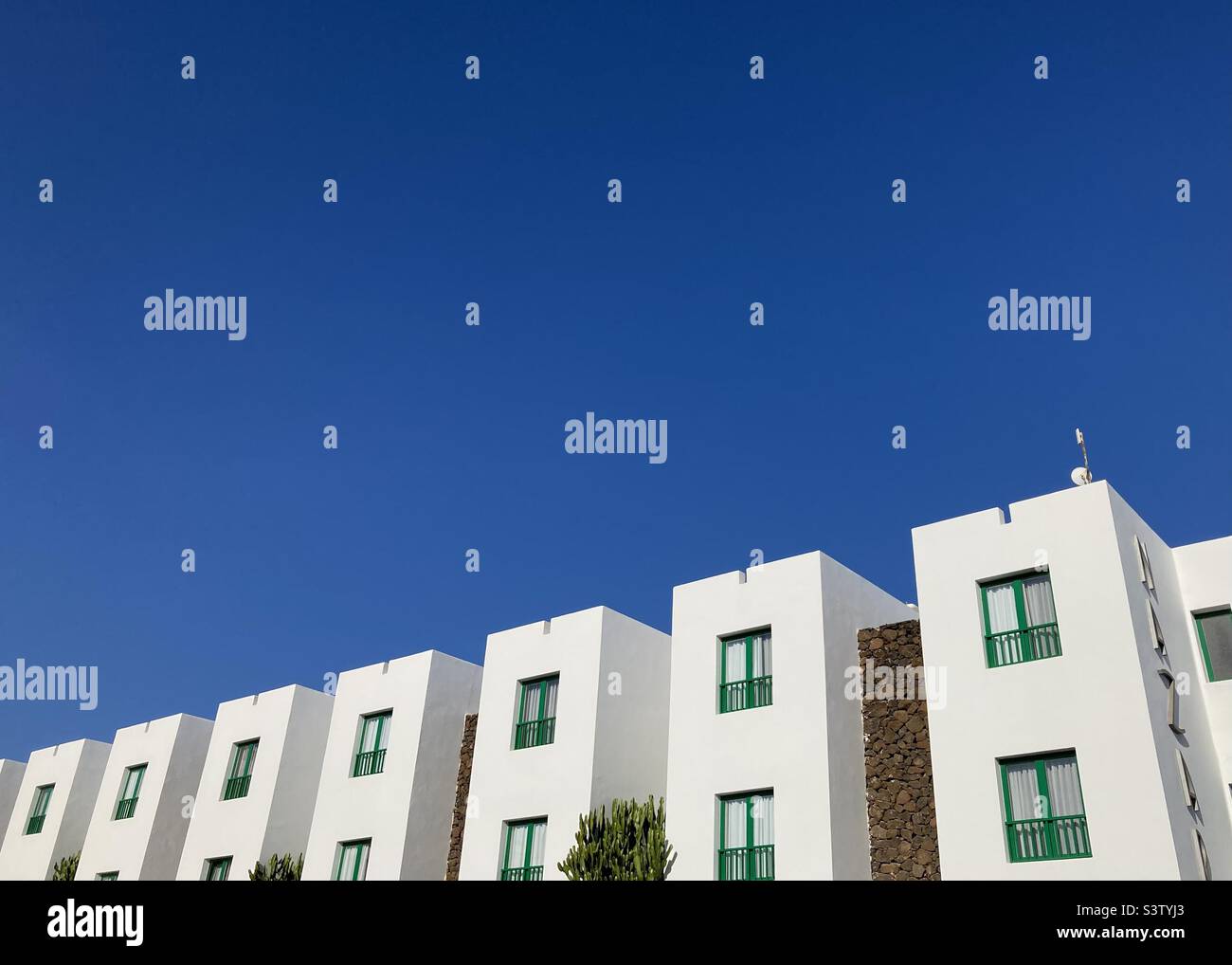 Row of buildings in Costa Teguise, Lanzarote Stock Photo