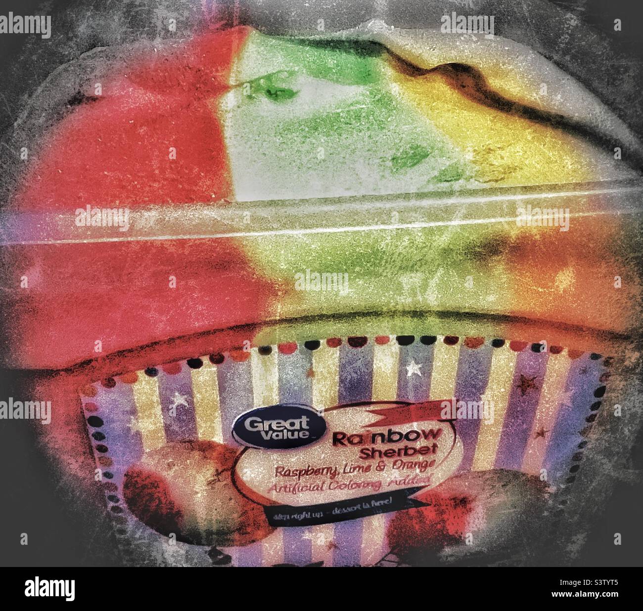 A gallon of Rainbow Sherbet ice cream set upon a kitchen tabletop in a home in Utah, USA. Grunge effects digitally added. - Smartphone Captured Stock Image