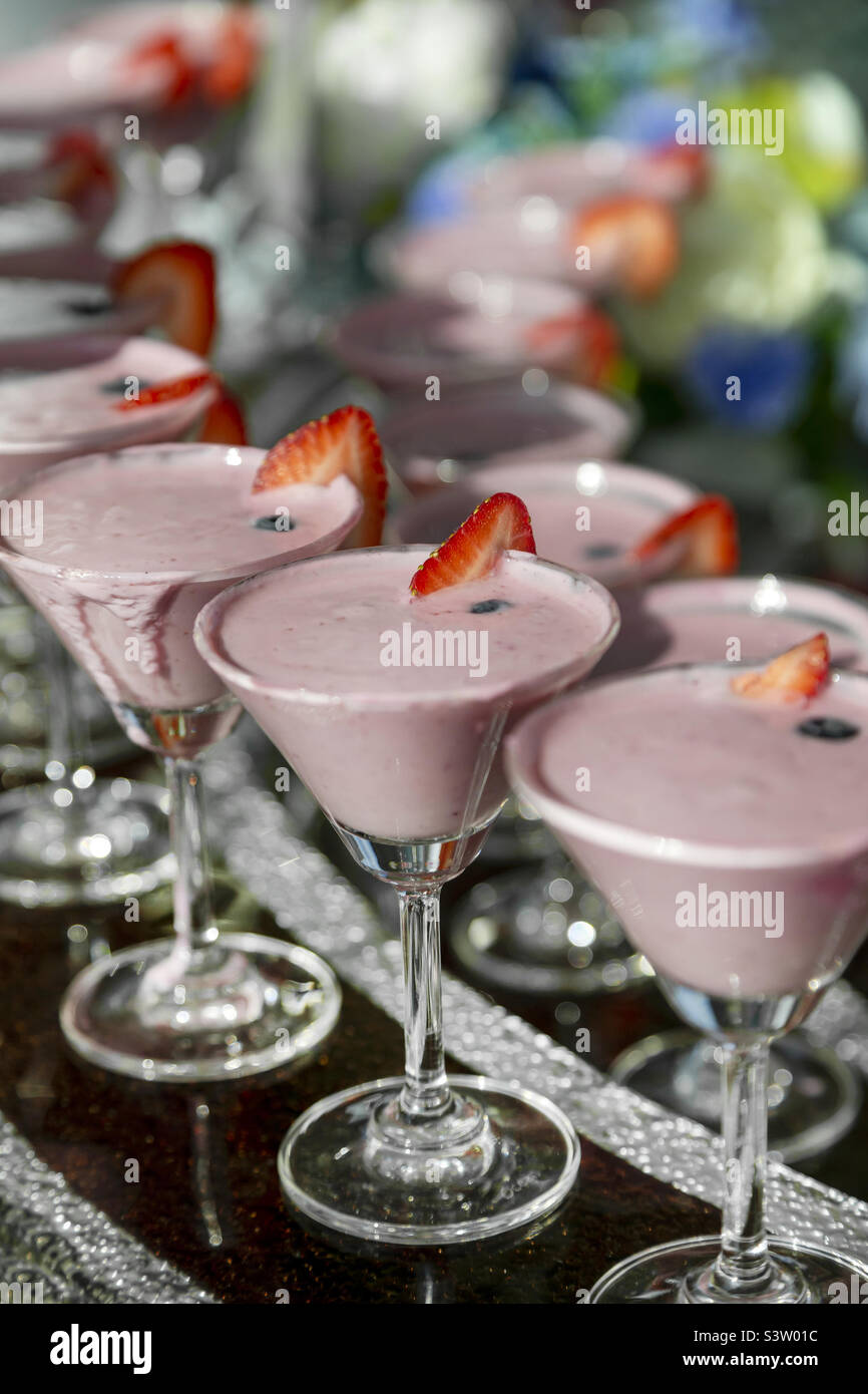 Fresh strawberry milkshakes ready for the party, delicious cold beverages Stock Photo
