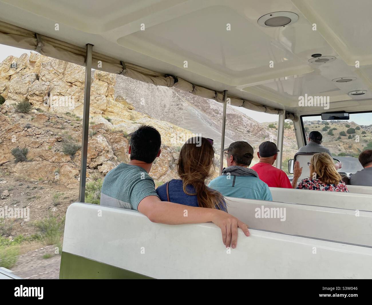 Shuttle at the Dinosaur National Monument in Vernal, Utah, USA transports visitors from the Visitor Center a short distance uphill to the quarry, or excavation, where the fossils and bones await. - Smartphone Captured Stock Image