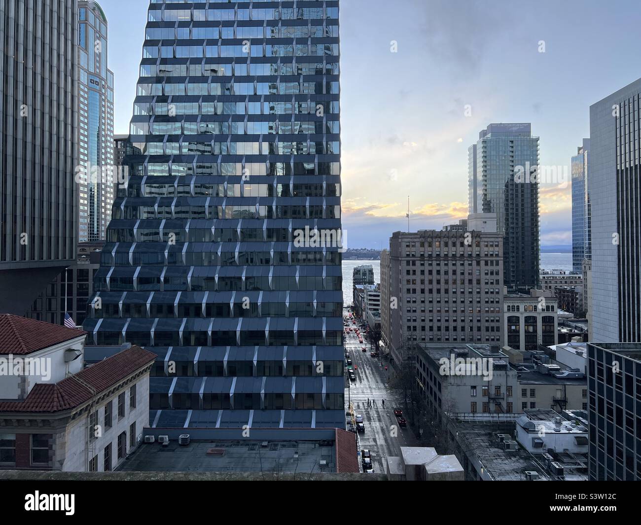 SEATTLE, WA, DEC 2021: looking towards Puget Sound, past Rainier Square development, and other skyscrapers in Downtown - Smartphone Captured Stock Image