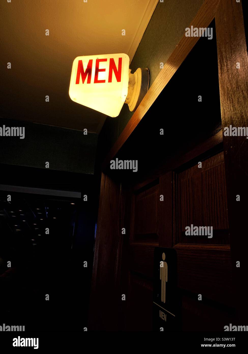 Vintage Men’s room sign in bar, Wisconsin - Smartphone Captured Stock Image