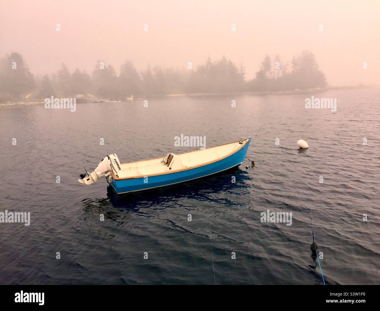Pink fog. Storm approaching. A sheltered cove of the Atlantic Ocean, Halifax, Nova Scotia, Canada. Stock Photo