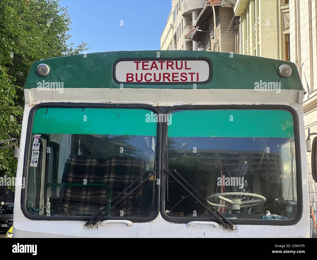 Vintage bus, direction sign, Theater of Bucharest, Romania Stock Photo