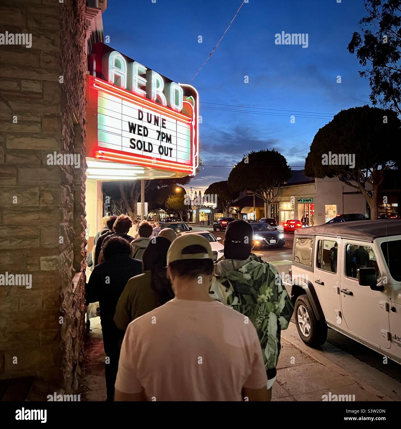 SANTA MONICA, CA, MAR 2022: Crowd lines up for sold-out screening of Denis Villeneuve's Dune movie, part one, at the Aero Theater - Smartphone Captured Stock Image
