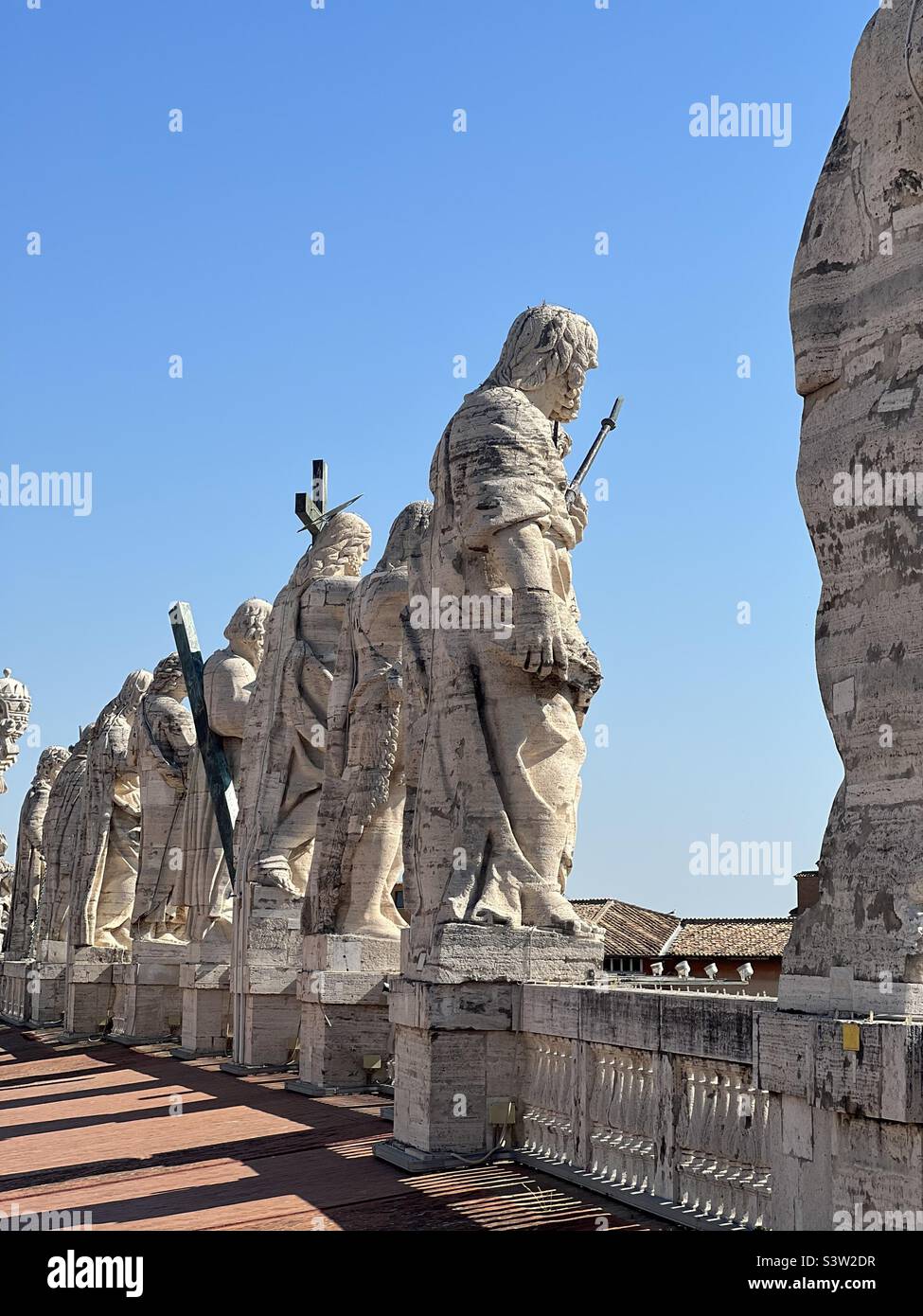Statues on the roof, St. Peter’s Basilica, Vatican statues, Italy travel photo, Vatican travel photo, Jesus Christ statue, Apostoles, St. Peter’s Square, St. Peter’s Cathedral Stock Photo