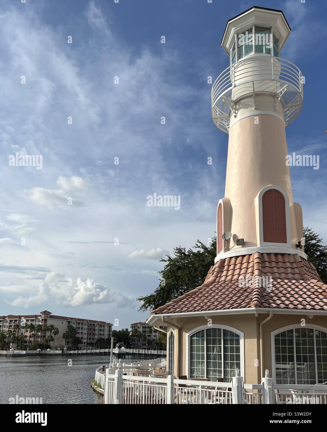 Lighthouse over a pond of water Stock Photo