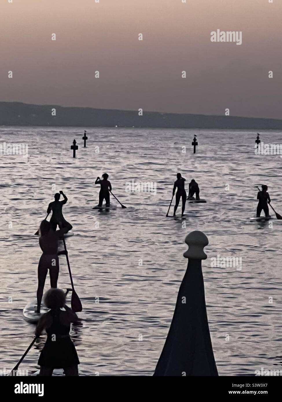 Sorrento paddle boarding at night Stock Photo Alamy