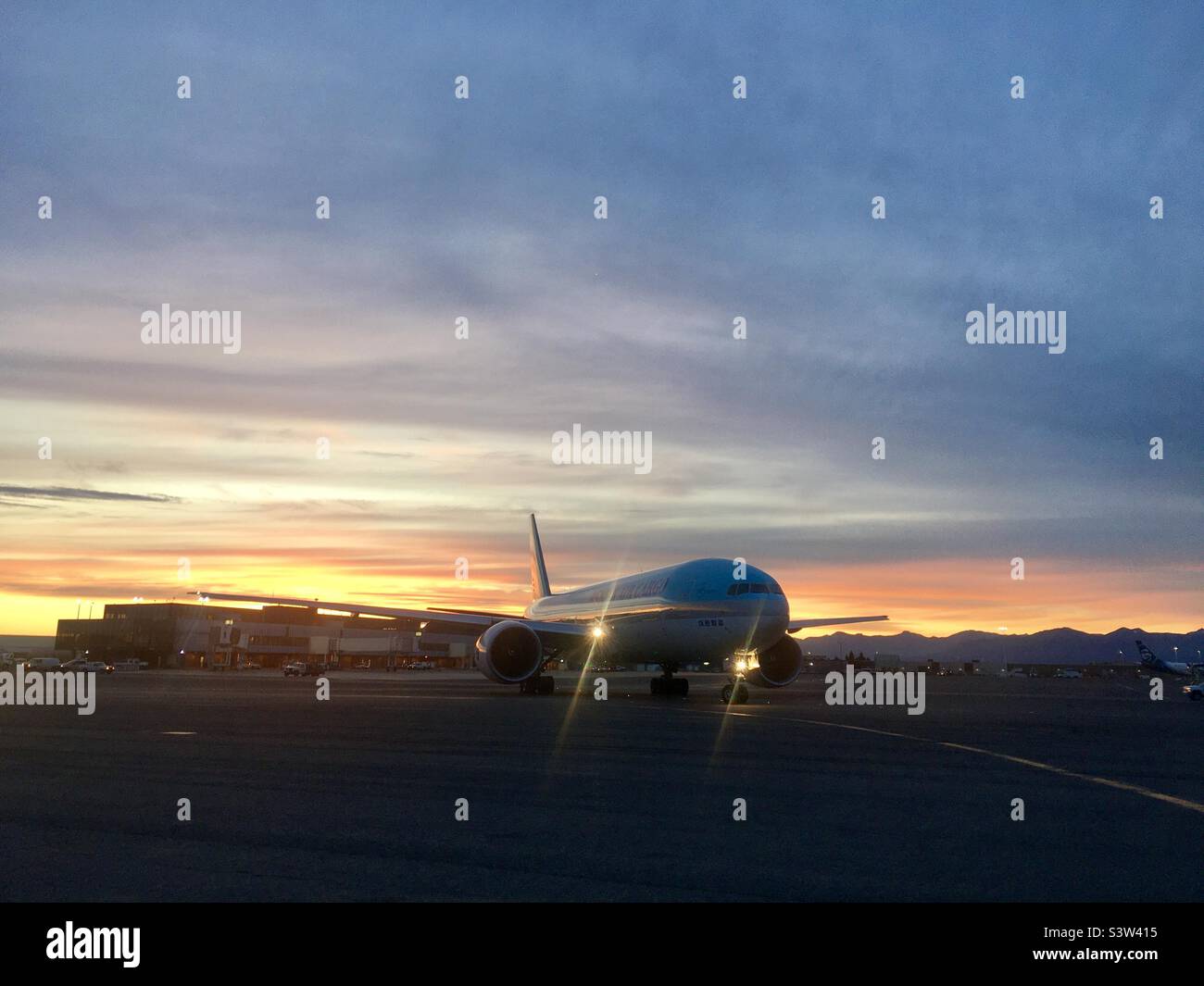 Korean Air Cargo Boeing 777 taxying at Dawn at Anchorage International Airport - Smartphone Captured Stock Image