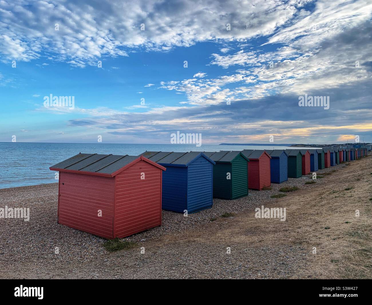Beach huts on Hastings beach uk Stock Photo