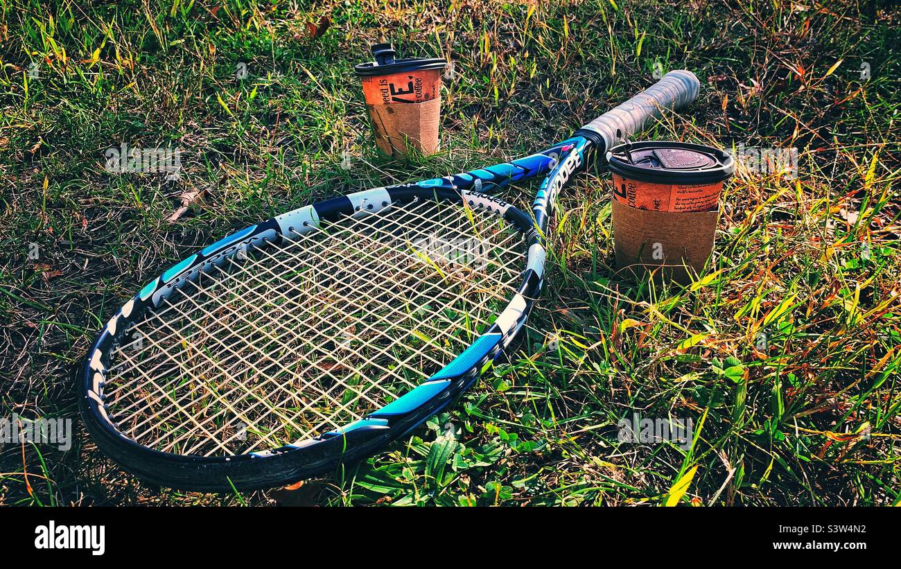 Tennis racquet and two coffees - Smartphone Captured Stock Image