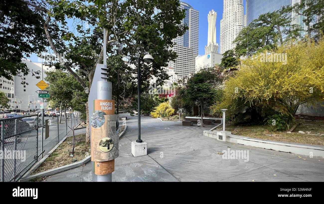LOS ANGELES, CA, APR 2022: fenced off park area next to Angels Flight funicular railway in Bunker Hill, Downtown. Skyscrapers in background - Smartphone Captured Stock Image