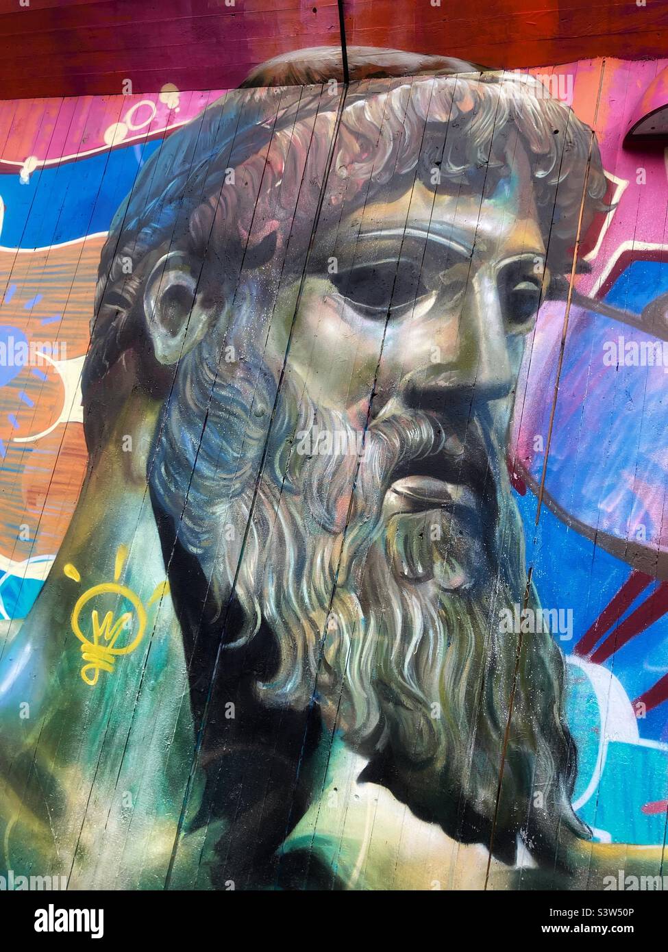 A depiction of the greek god Poseidon as part of a graffiti in Gothenburg, Sweden - Smartphone Captured Stock Image