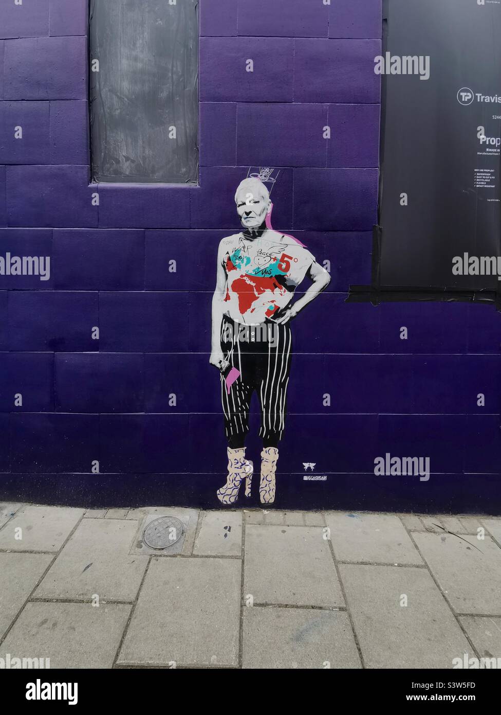 vivienne westwood graffiti in London on purple brick wall Stock Photo