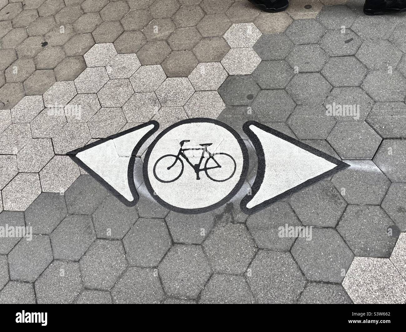 Bike lane sign on the pavement - Smartphone Captured Stock Image