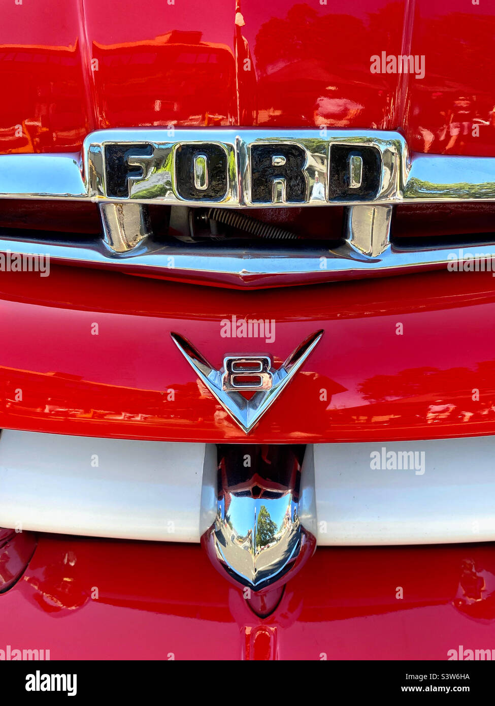 Old red Ford V8 truck, front view - Smartphone Captured Stock Image