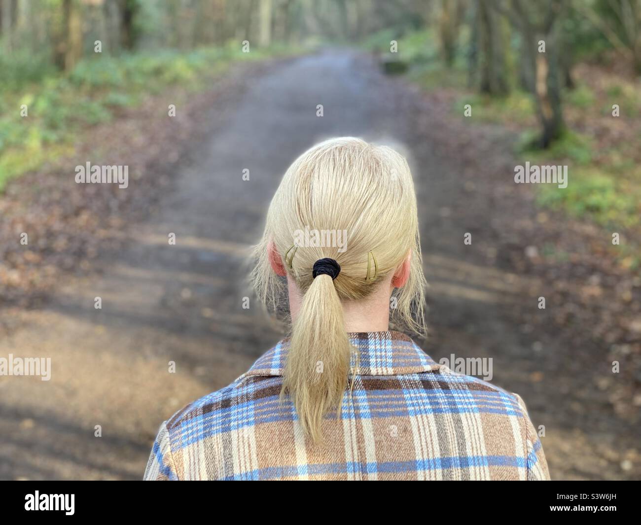 Woman rear view coat hi-res stock photography and images - Alamy
