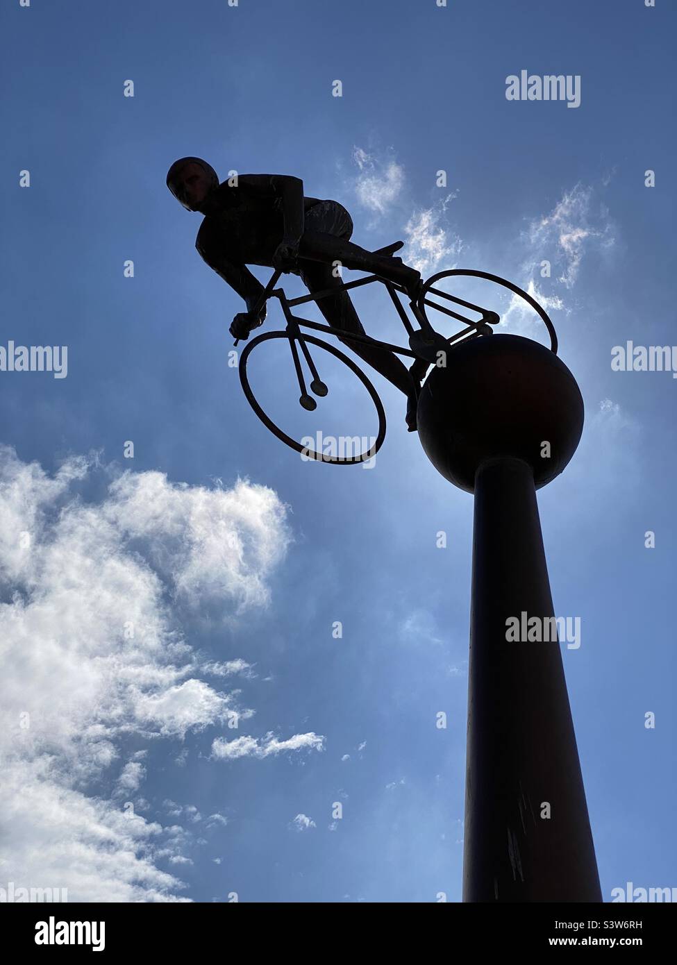 A silhouette of the sculpture depicting Professor Albert Powsey’s “Dive of Flames” performance off Southport Pier. An exhibitionist of the 20th Century! Photo ©️ COLIN HOSKINS. - Smartphone Captured Stock Image