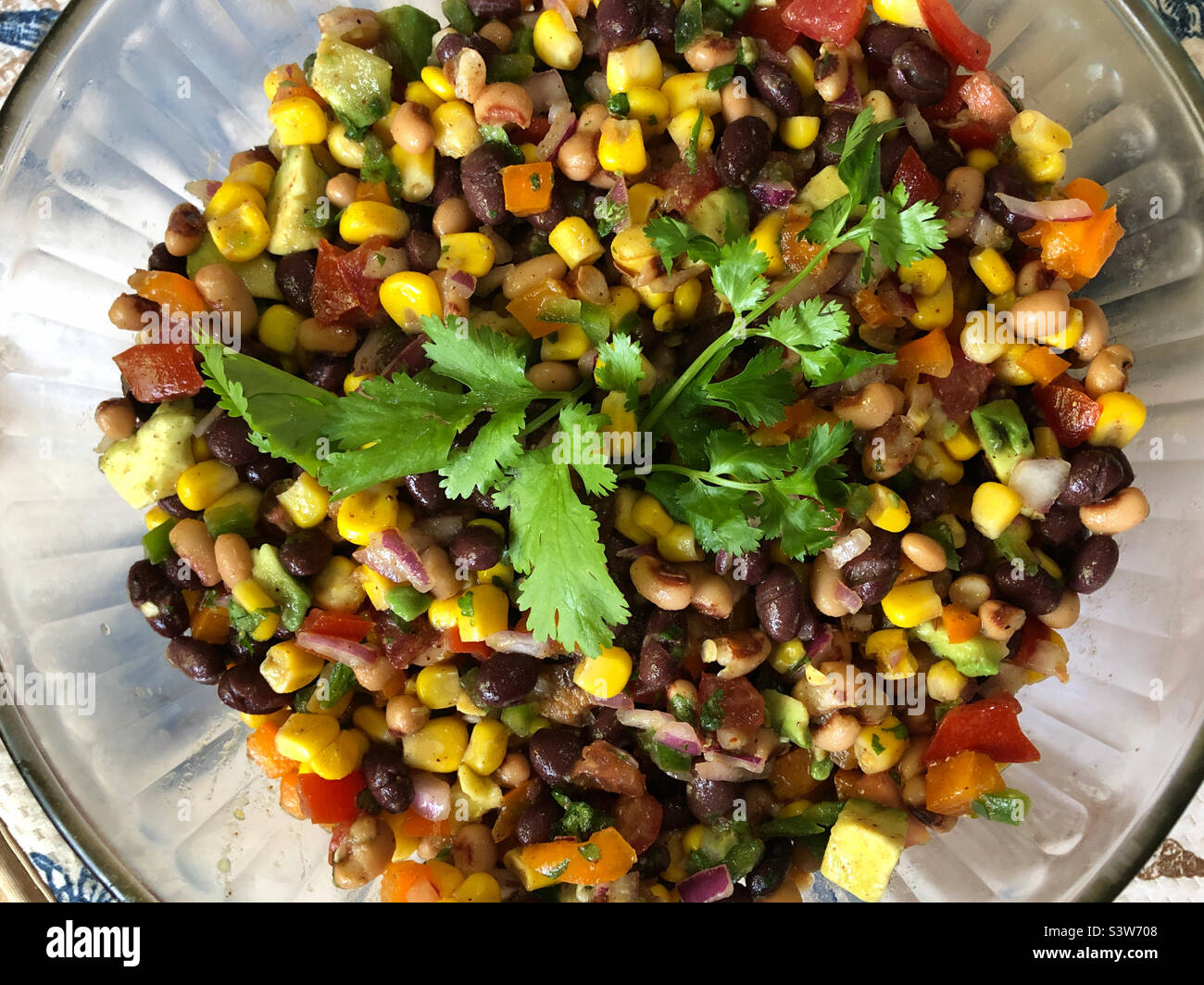 Cowboy caviar Tex-Mex dip with a savory dressing of olive oil, lime juice, honey and spices. Stock Photo