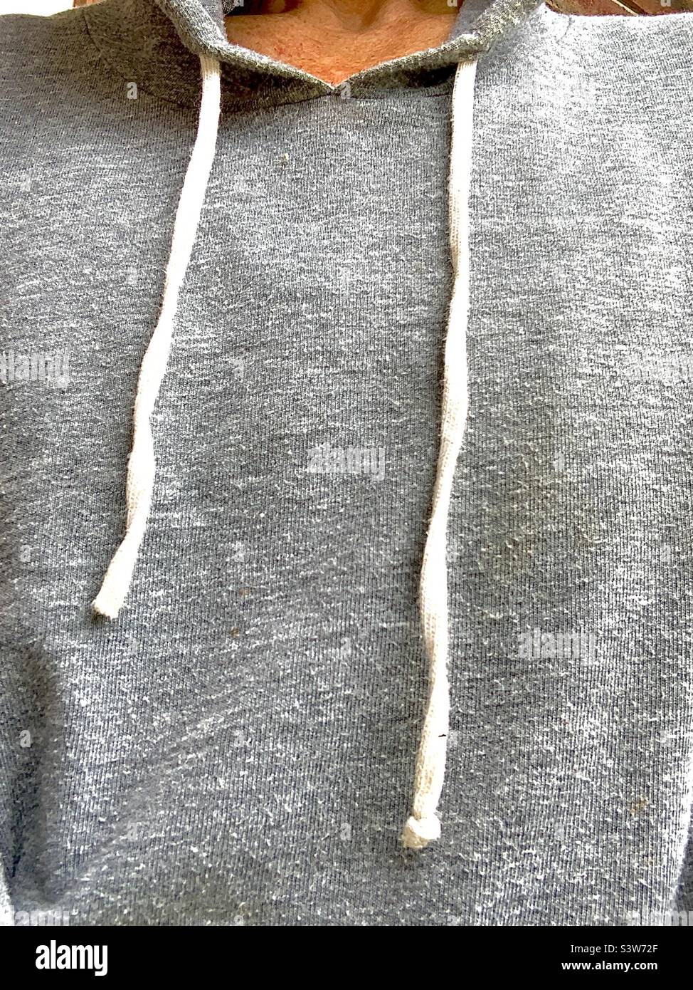 Gray Hoodie with White Strings Stock Photo