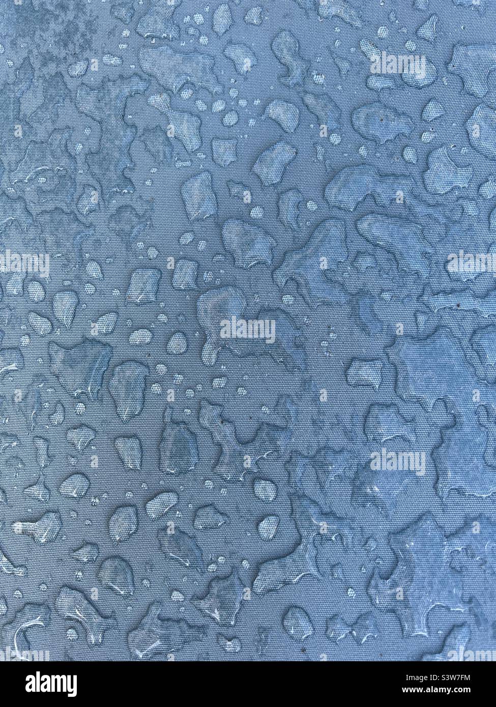 Abstract background of water droplets on blue background Stock Photo
