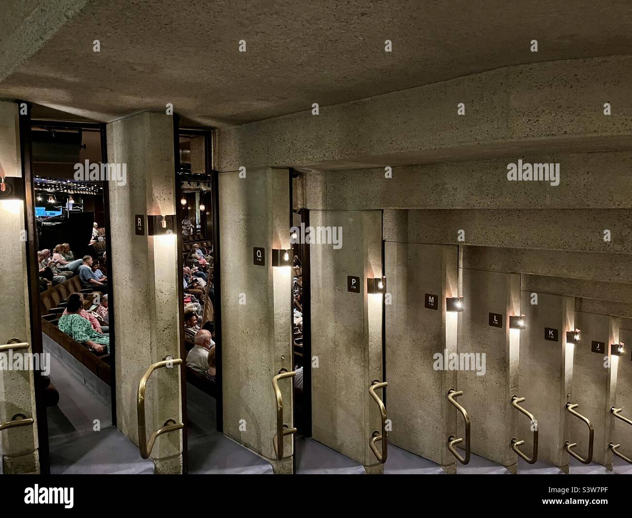 Barbican Theatre and the access of each row by a separate door. This makes the auditorium aisle free. London. - Smartphone Captured Stock Image