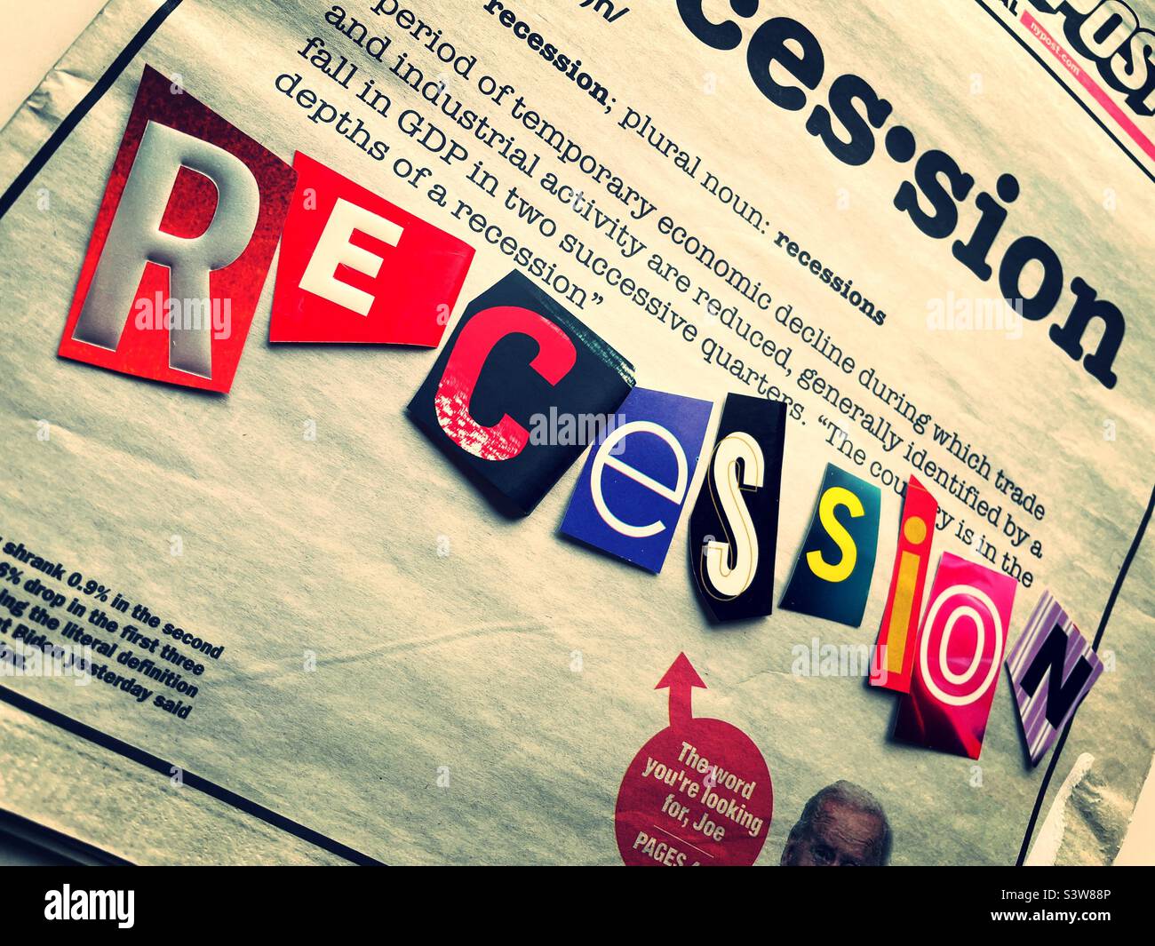 Recession spelled out in Ransom note style  on the front page of the New York newspaper, 2022, New York City, United States - Smartphone Captured Stock Image