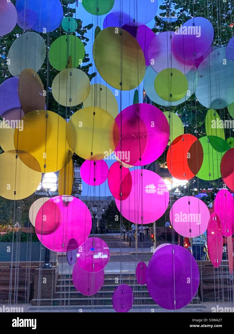 Canary Wharf summer lights exhibition installation - round colourful circles Stock Photo