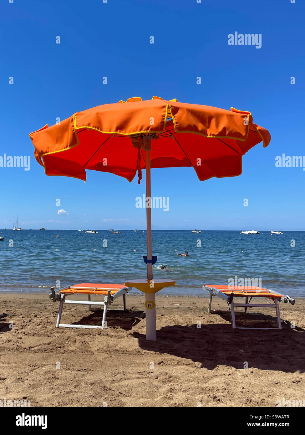 Sun umbrella on the beach Stock Photo Alamy