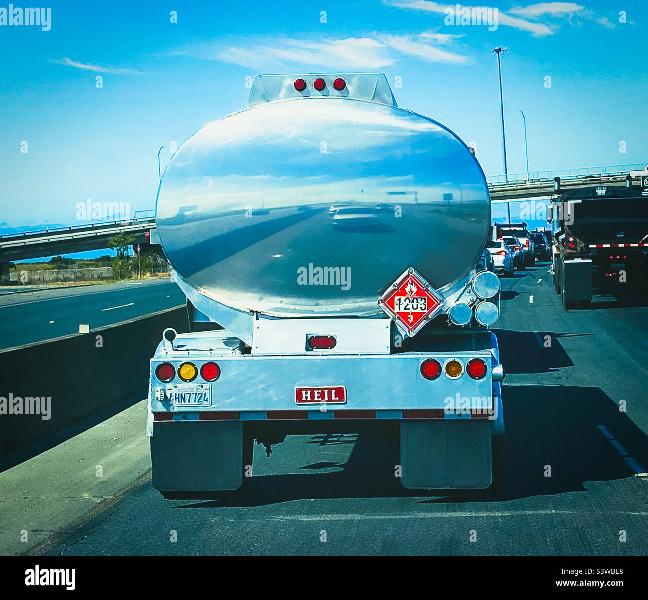 Reflection in the back of a tanker on a highway in California, USA - Smartphone Captured Stock Image