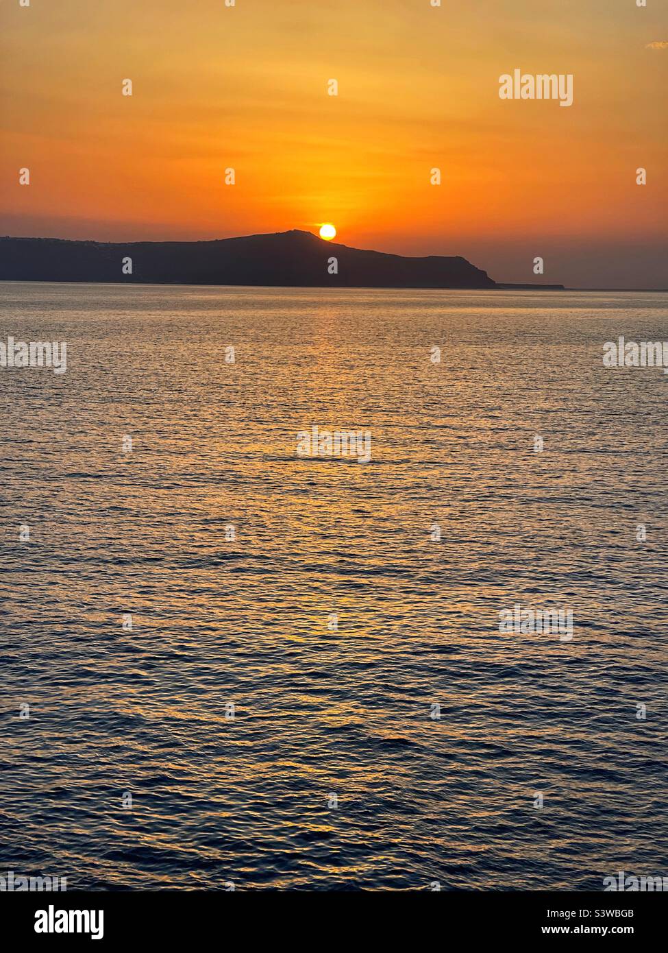 Sunset over the Caldera in Santorini Stock Photo