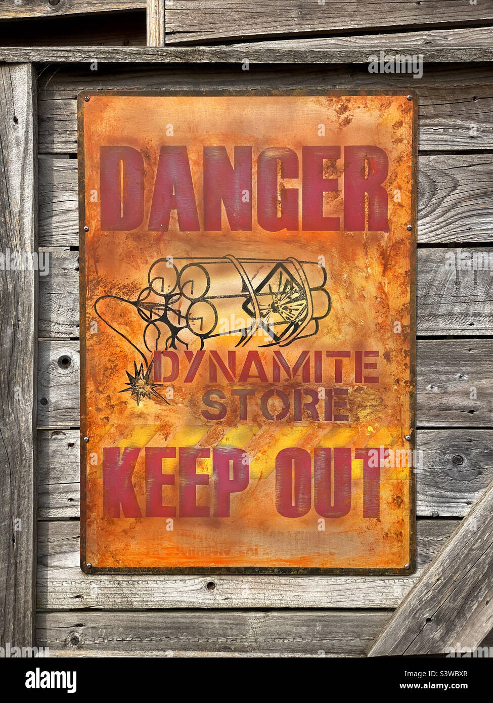 DANGER. DYNAMITE STORE. KEEP OUT. Photo ©️ COLIN HOSKINS. Stock Photo