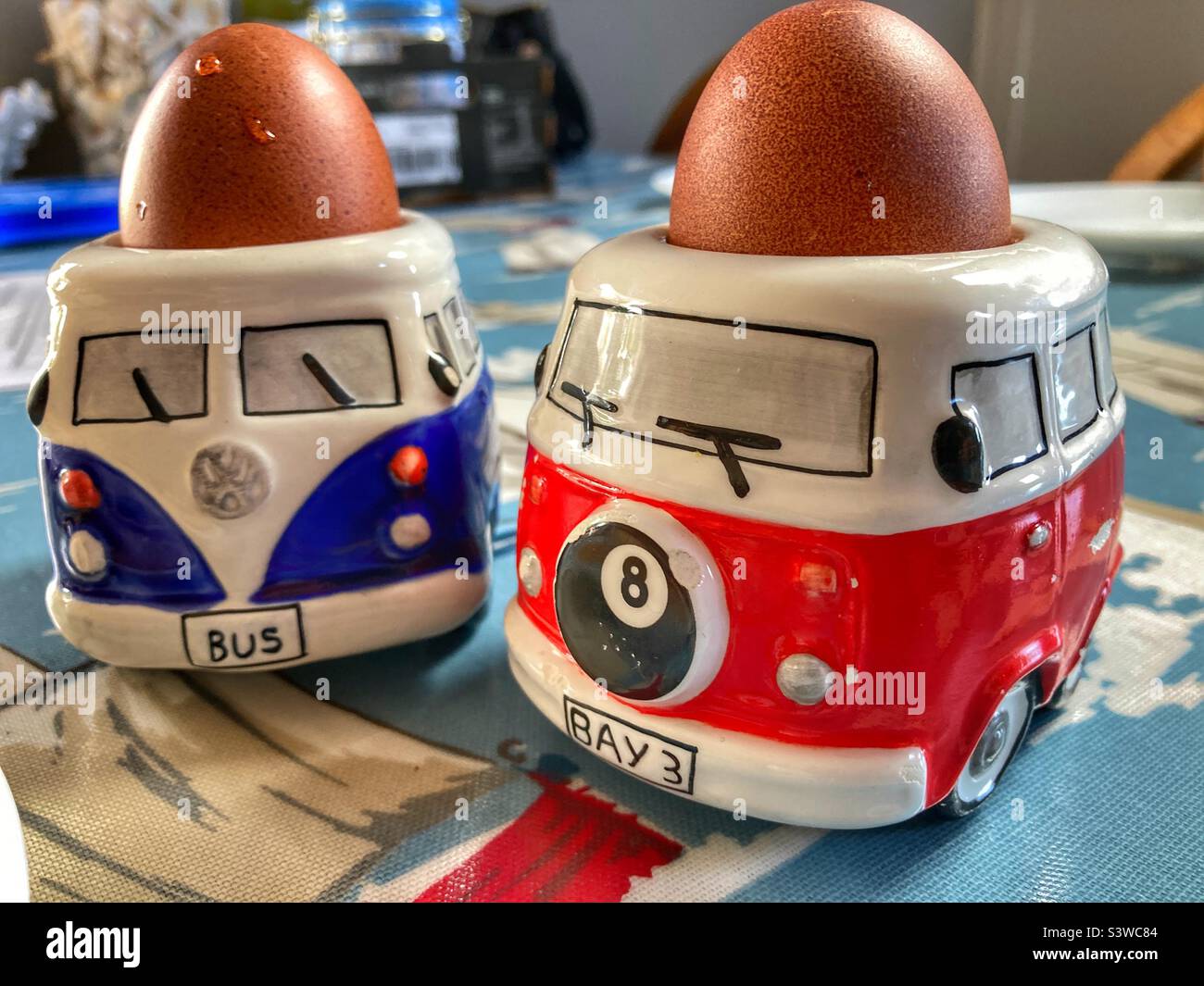 Boiled eggs in VW Camper Van egg cups Stock Photo