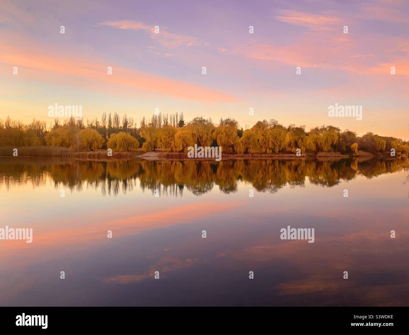 Beautiful colorful sky over the lake in autumn - Smartphone Captured Stock Image