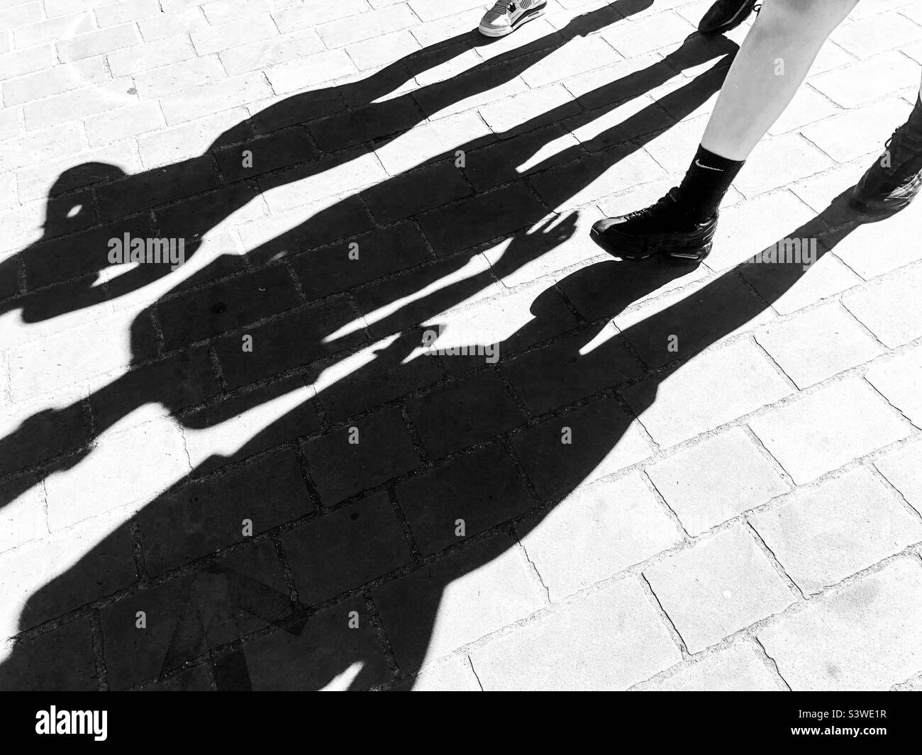 Walking shadows - Smartphone Captured Stock Image