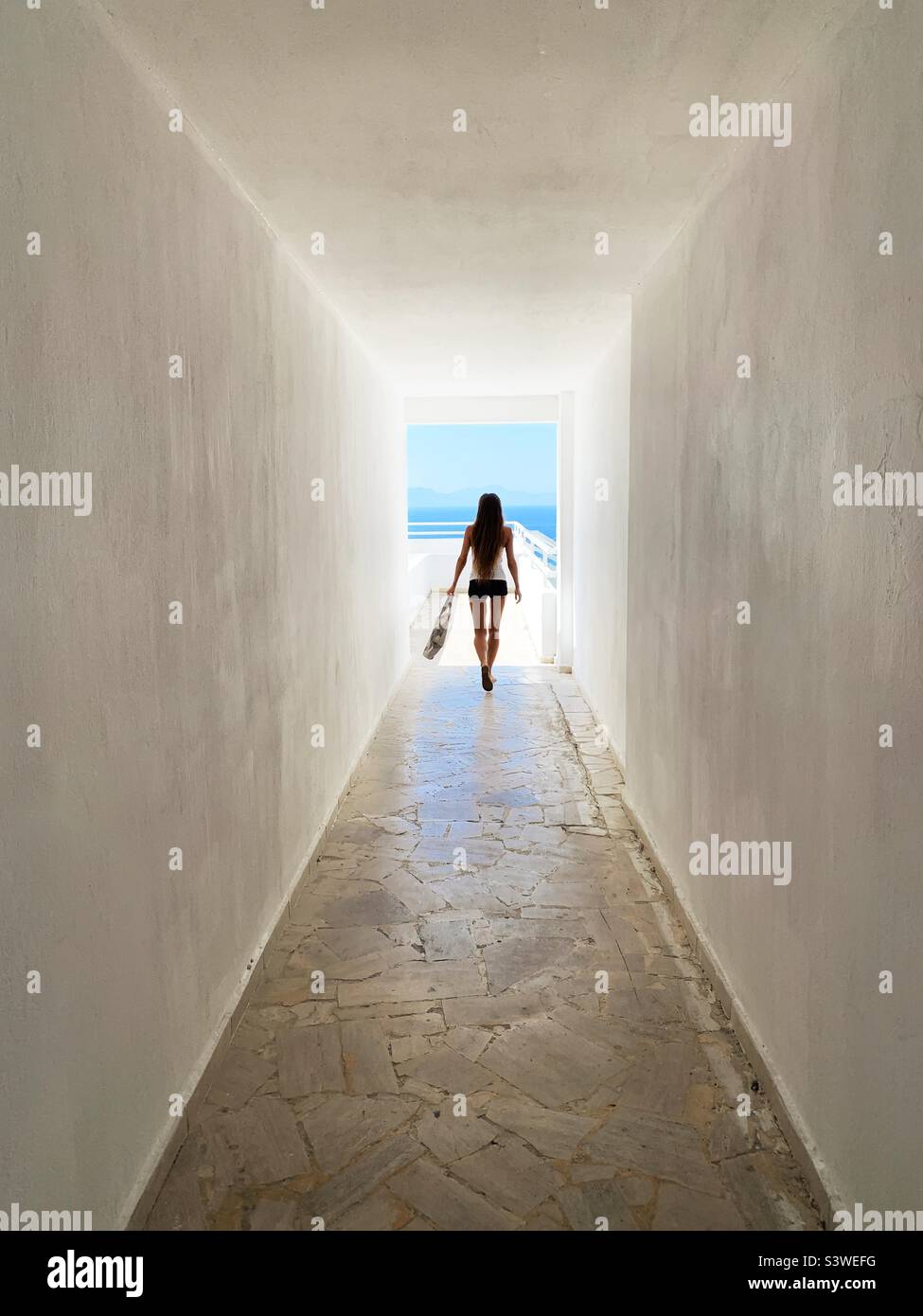 Walking through the white corridor - Smartphone Captured Stock Image