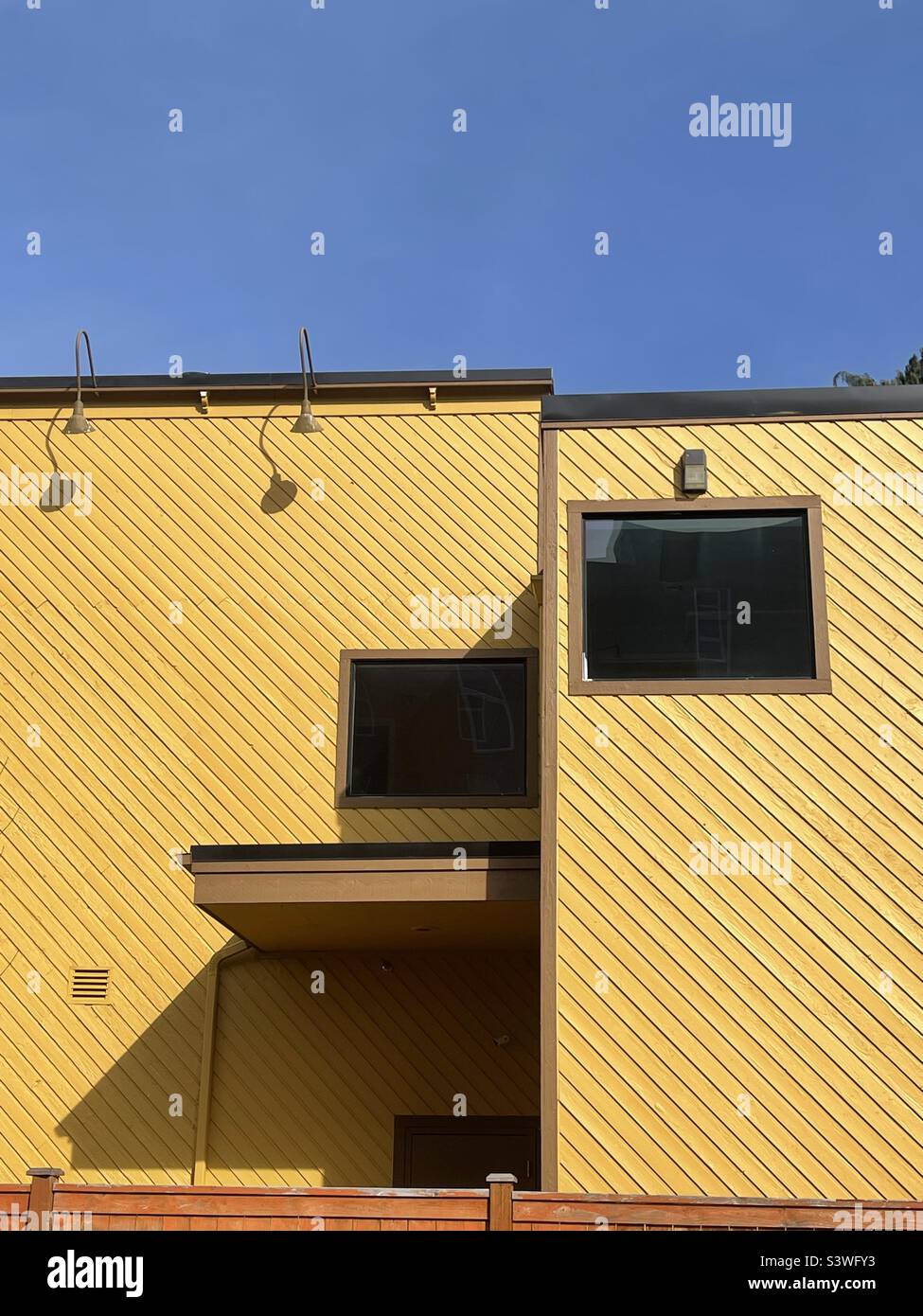 Blue sky and yellow wall Stock Photo