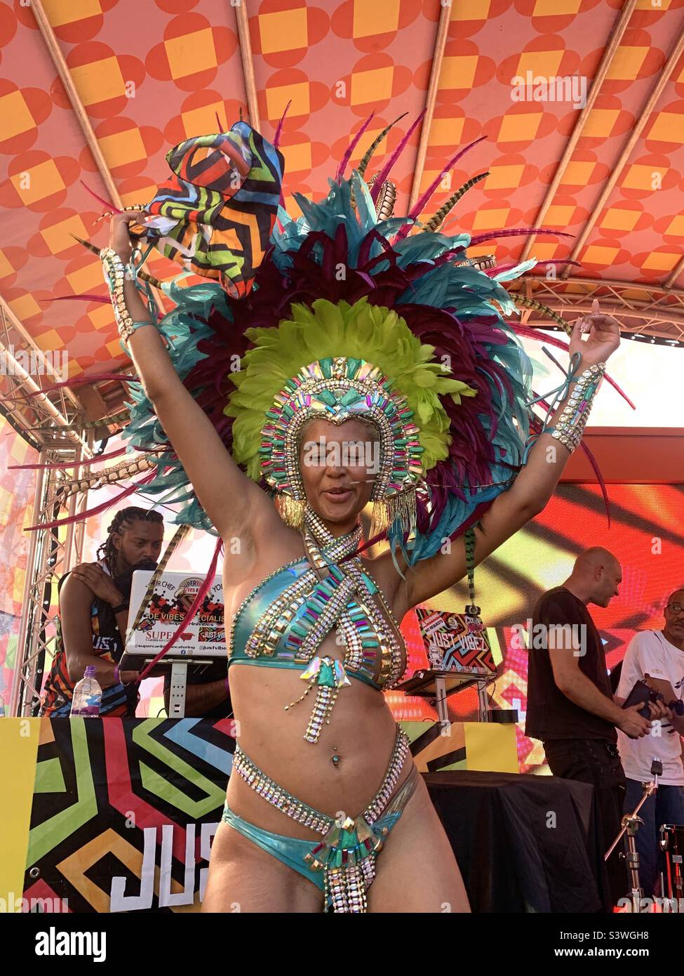 Beautiful woman in carnival clothing on stage in London Stock Photo