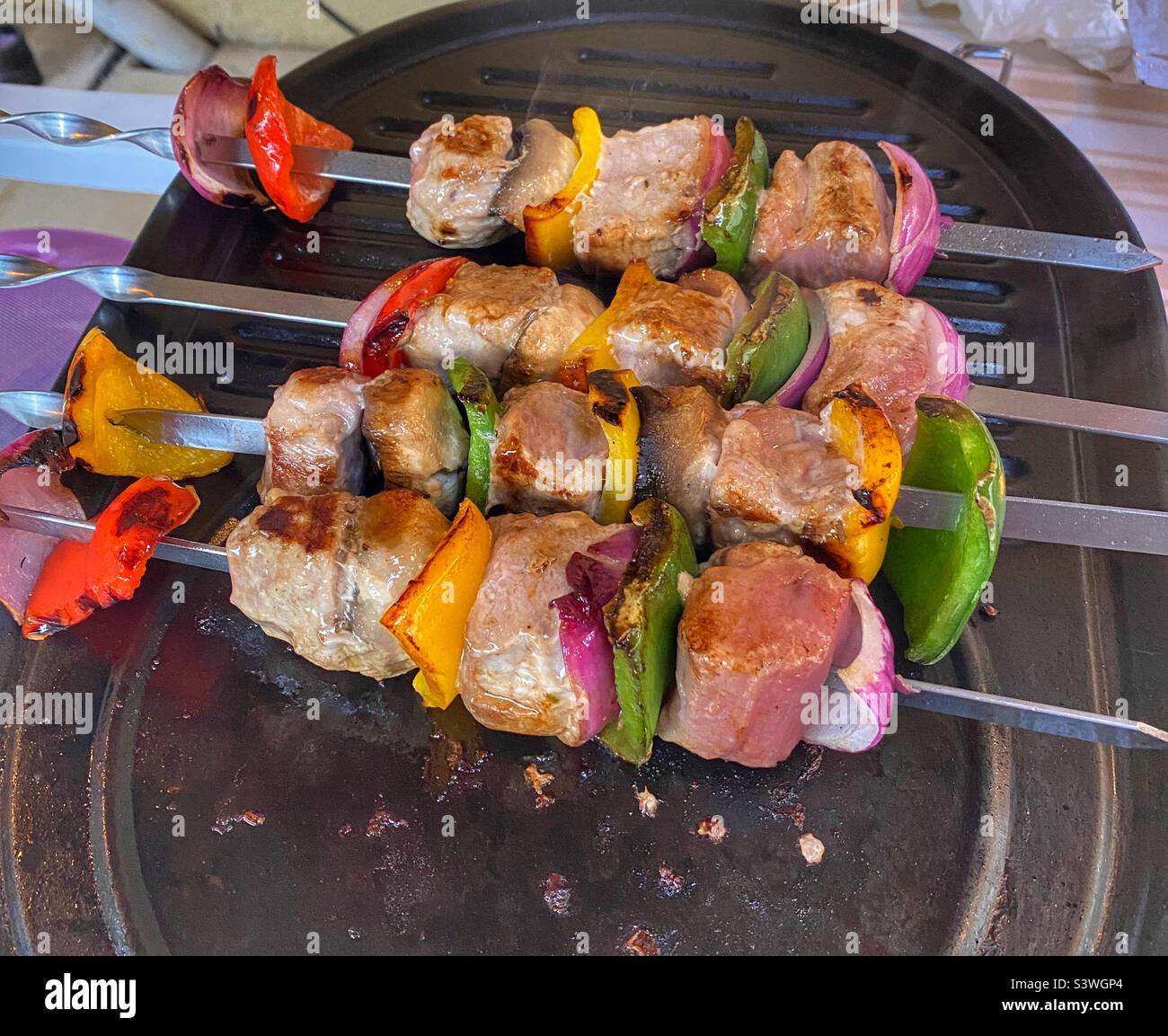 Pork skewers on a barbecue Stock Photo Alamy