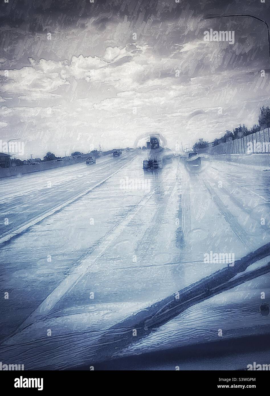 Driving through monsoonal rains in late summer in Utah, USA. Image has been made painterly and has been otherwise altered for artistic effect. - Smartphone Captured Stock Image