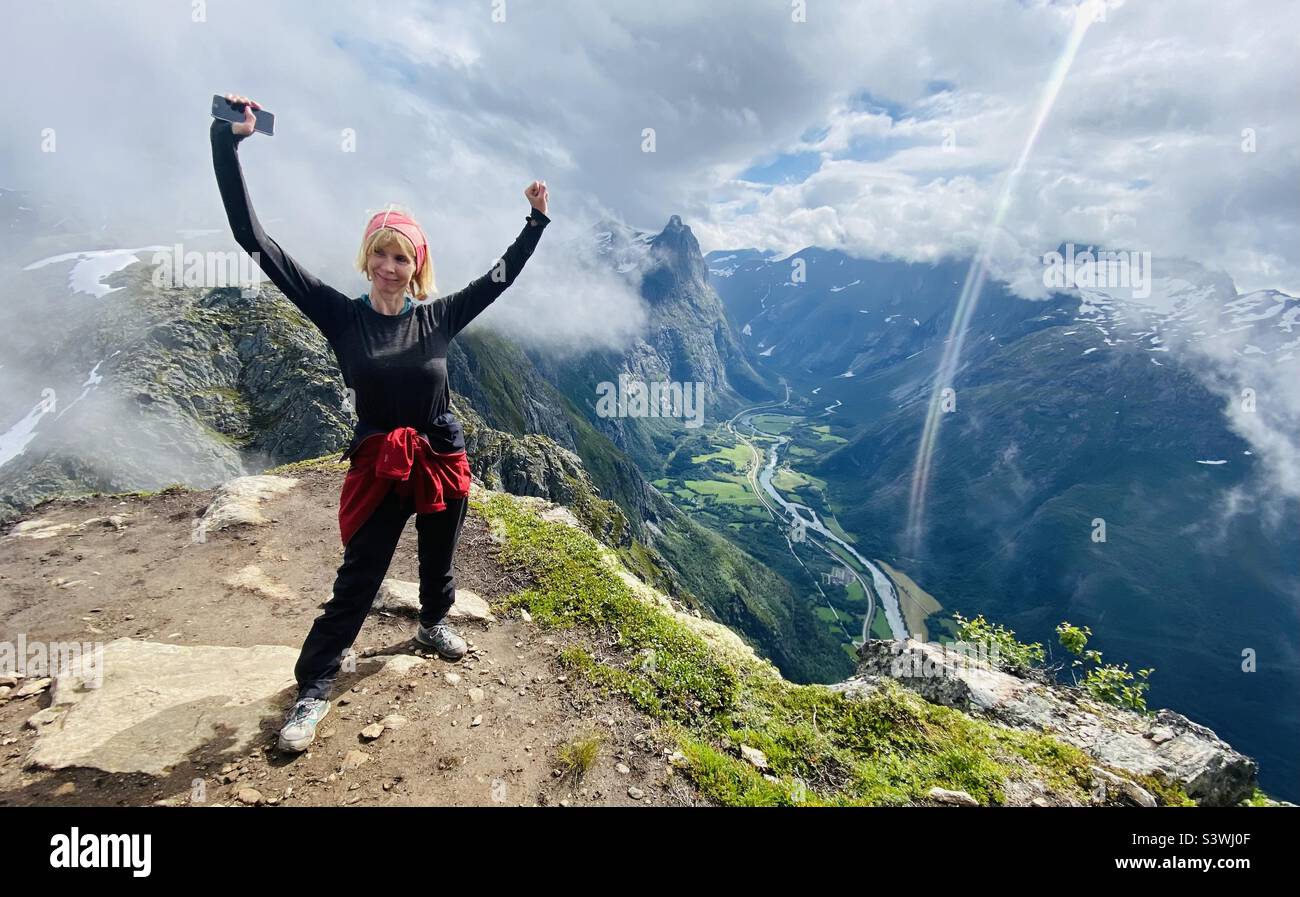 Woman on top of mountain hi-res stock photography and images - Alamy