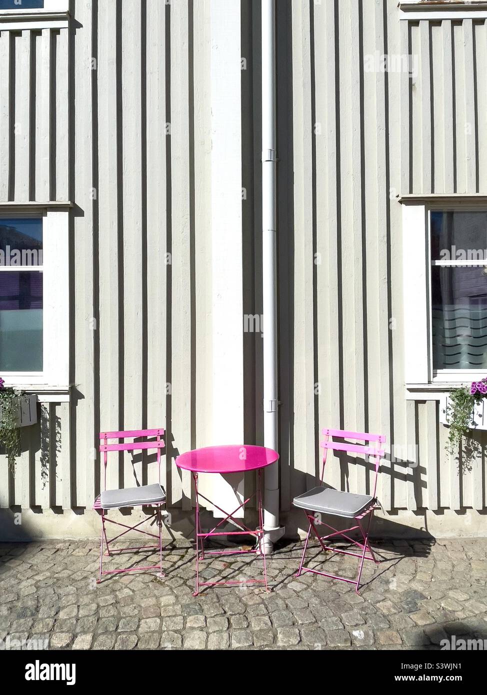 Pink table and chairs - Smartphone Captured Stock Image