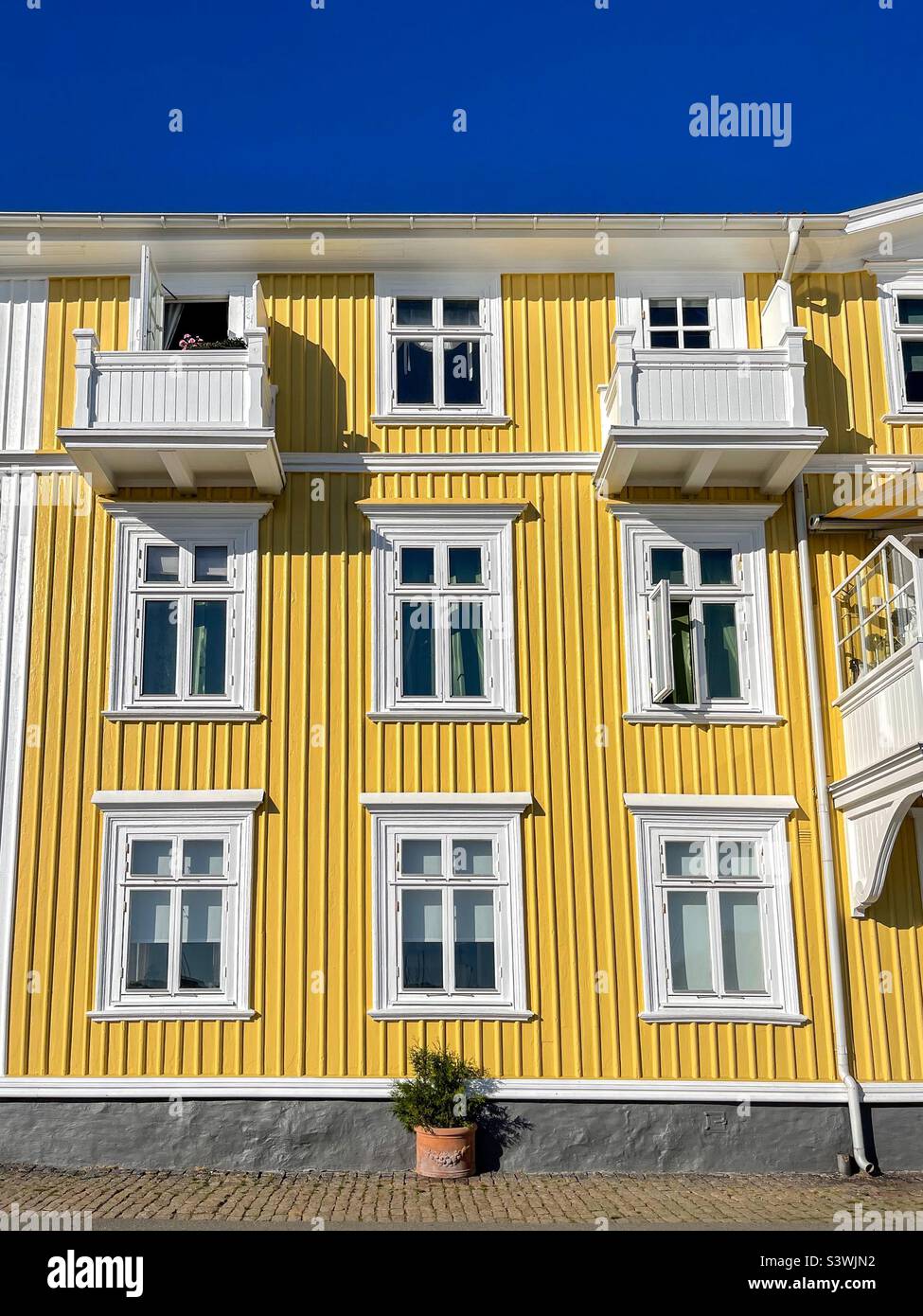 Yellow house. Arendal. Norway - Smartphone Captured Stock Image