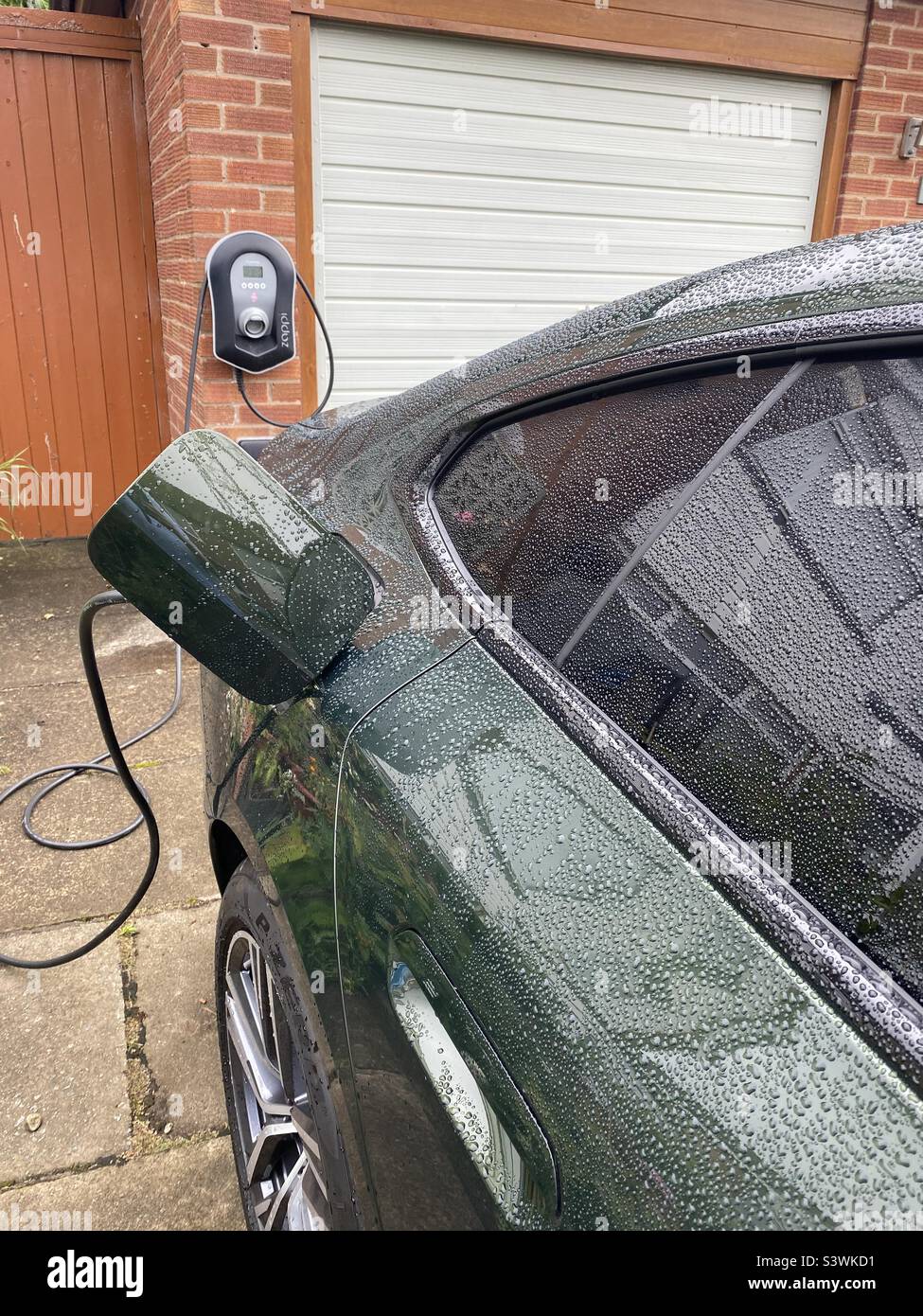 Electric Car Charging - Smartphone Captured Stock Image
