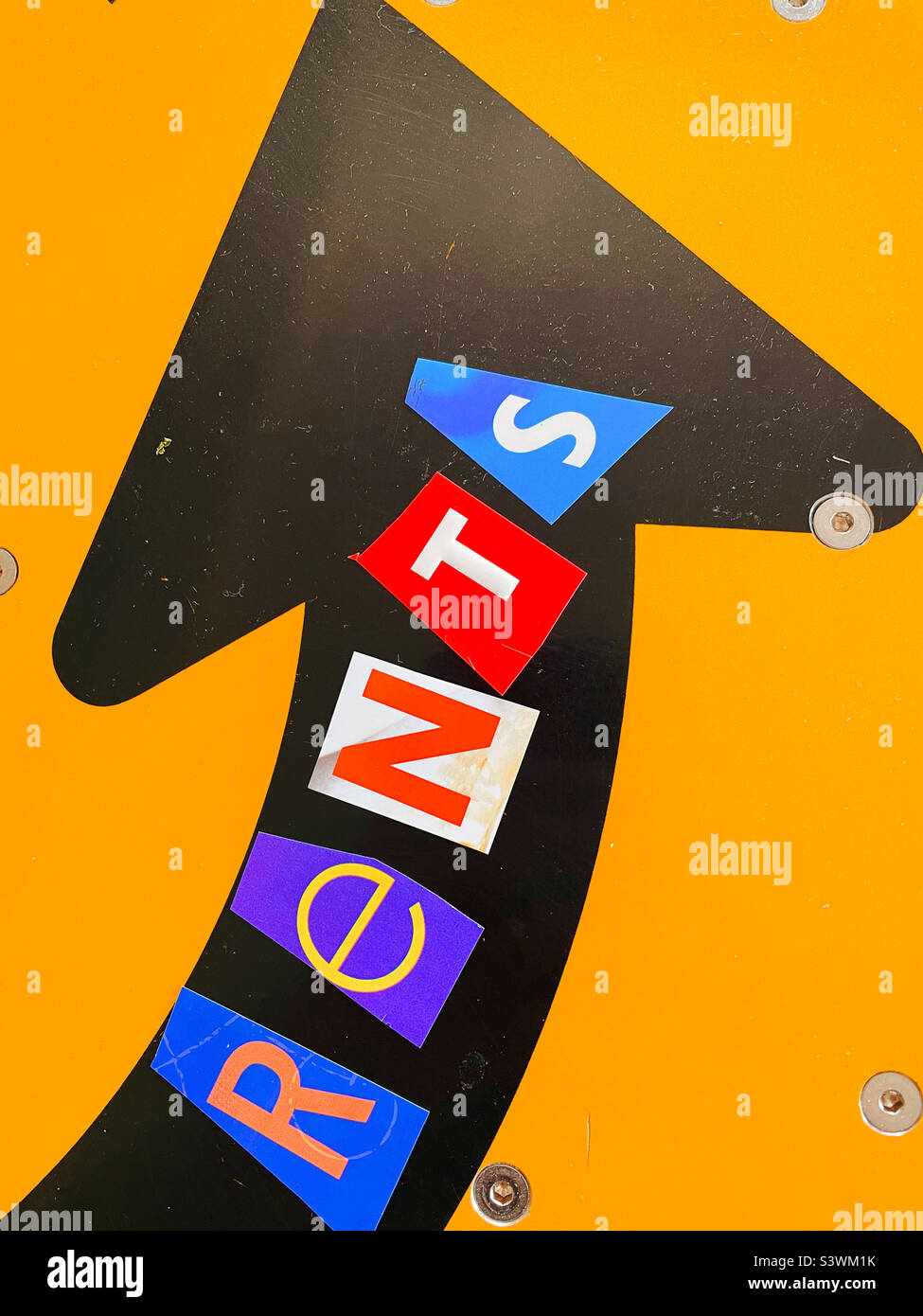 Rising rent costs concept spelled out with ransom note letters and an