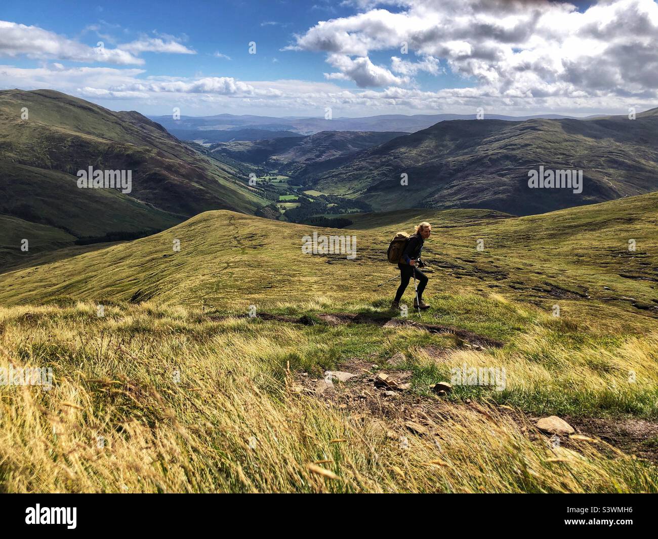 Walker on the hills above Glen Lyon, Perthshire, Scotland Stock Photo